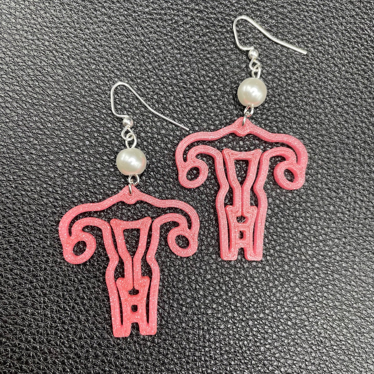 Pink Glitter Uterus dangle earrings | femme, woman, medical, feminist
